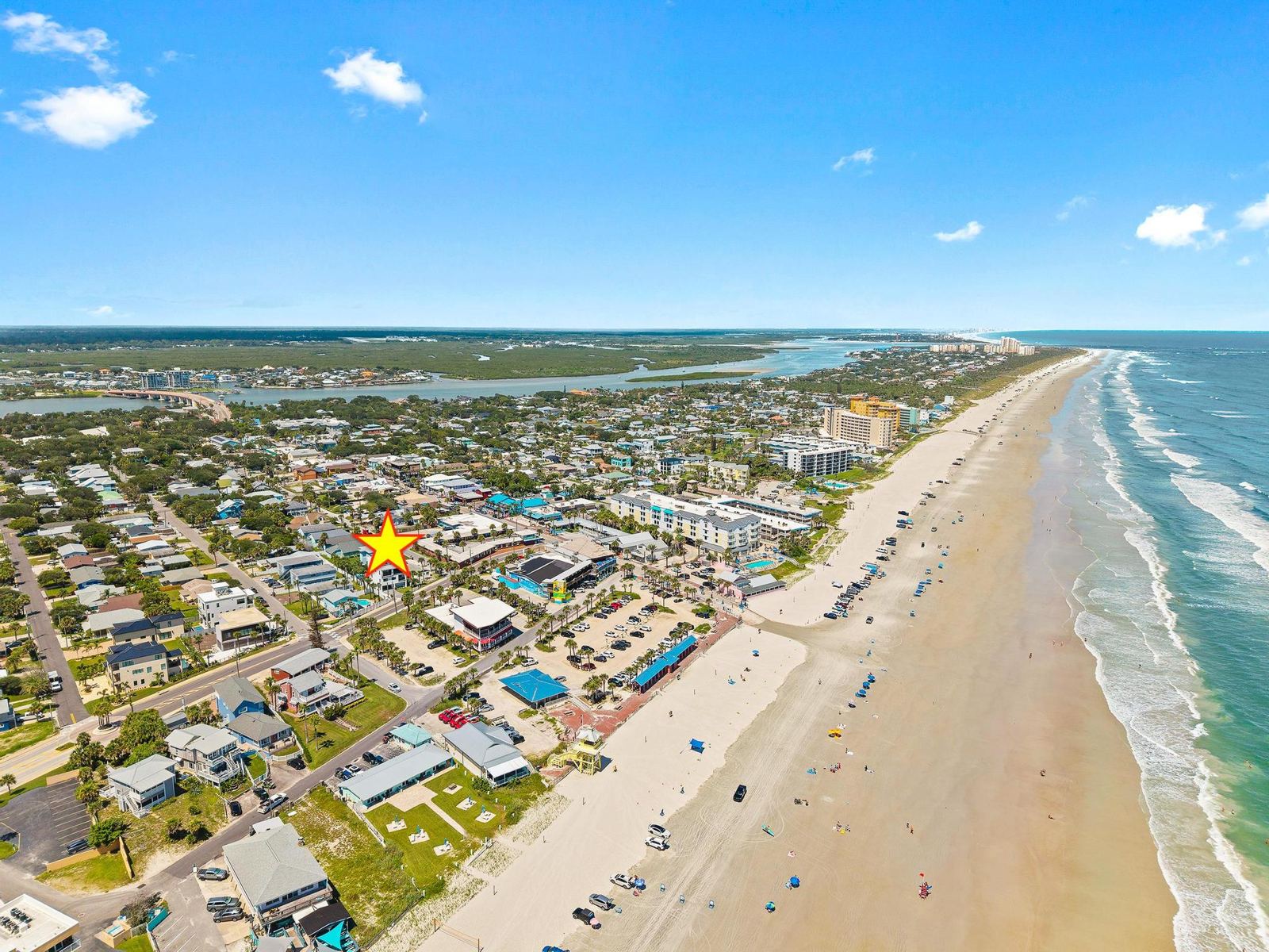 Aerial view of the coastline near the home