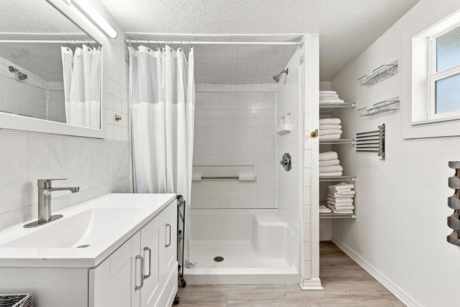 Guest house bathroom with walk-in shower