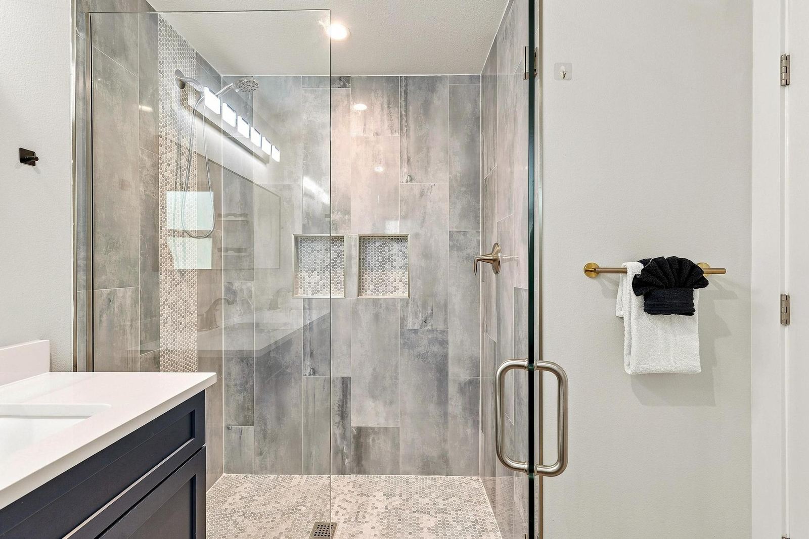 Ground-floor bathroom with tiled walk-in shower