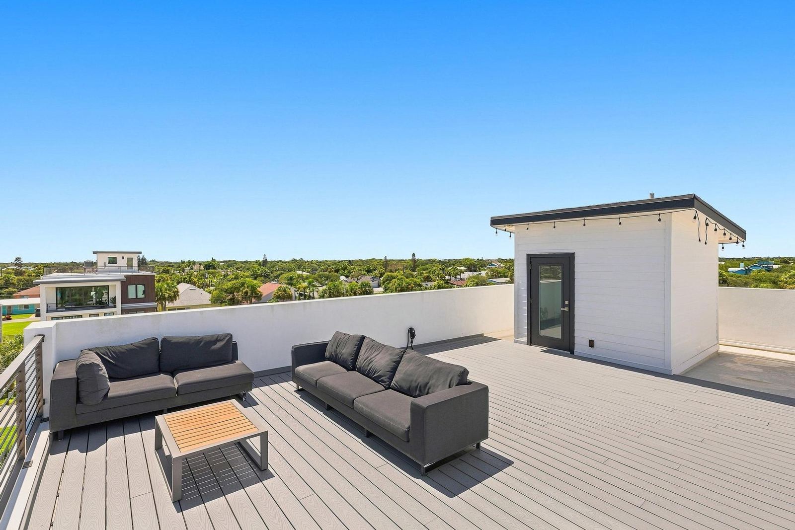 Rooftop lounge seating and elevator house